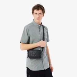 Sacoche verticale monogramme en cuir 