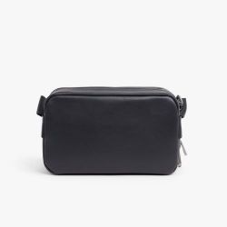 Sacoche verticale monogramme en cuir 